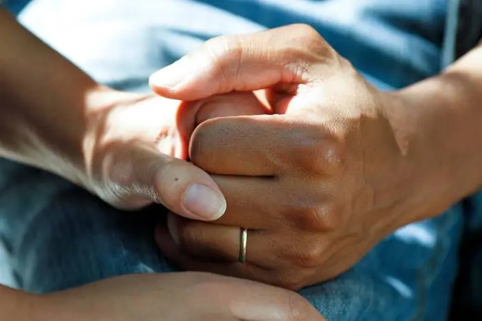Two hands held together